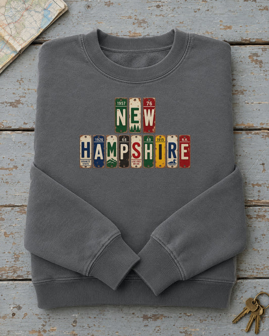 New Hampshire vintage license plate sweatshirt in Pepper