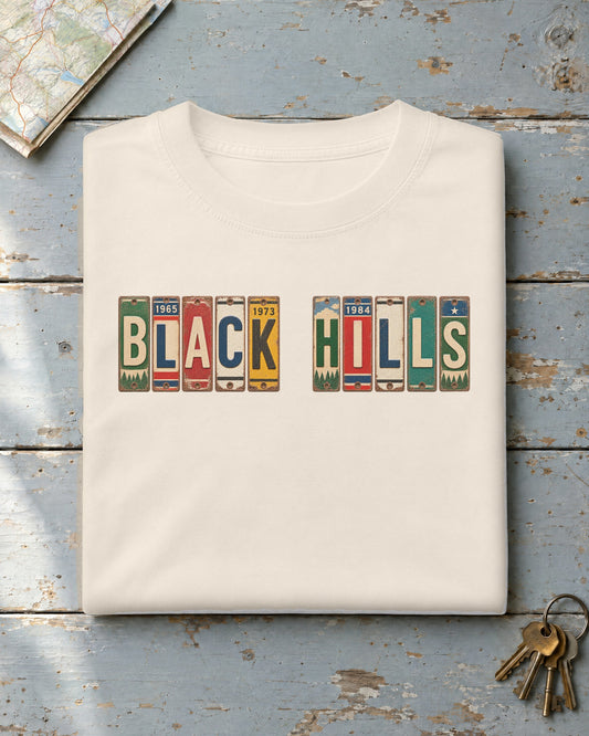 Black Hills, South Dakota vintage license plate t-shirt in Ivory