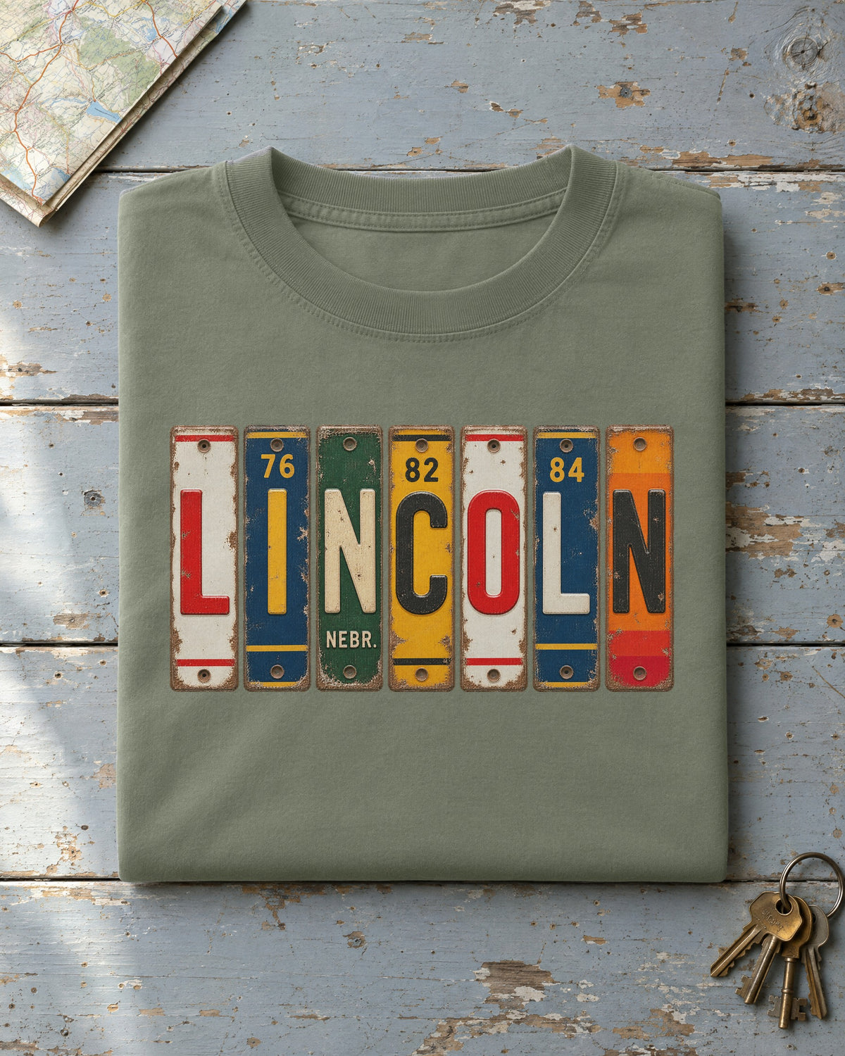 Lincoln, Nebraska vintage license plate t-shirt in Moss