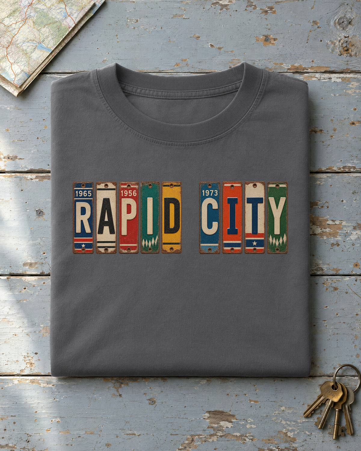 Rapid City, South Dakota vintage license plate t-shirt in Pepper