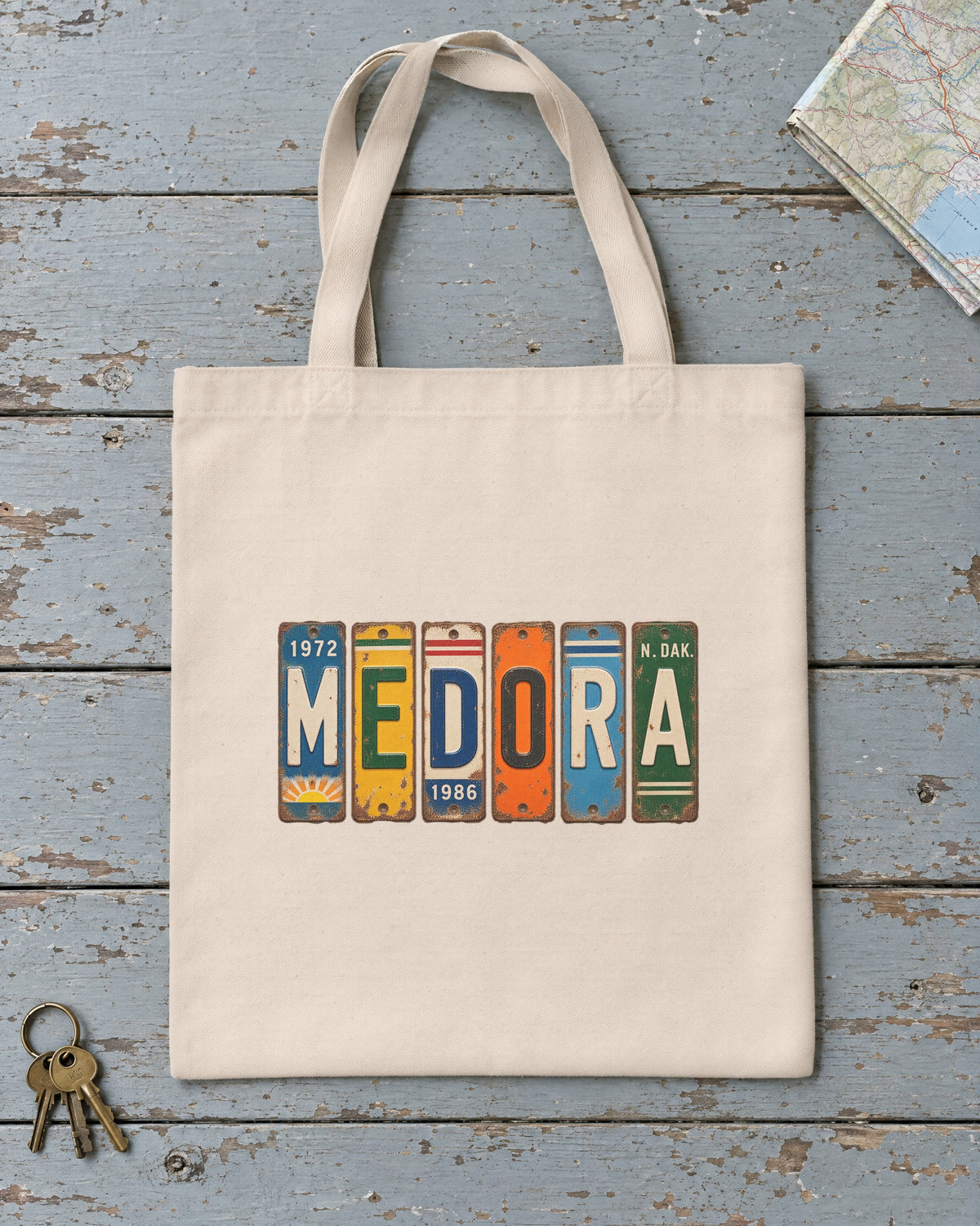 Medora, North Dakota vintage license plate tote bag in Natural