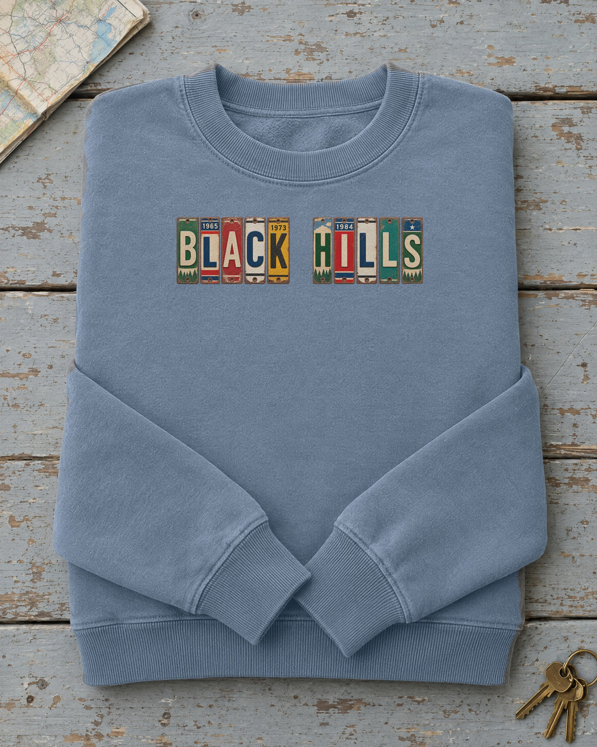Black Hills, South Dakota vintage license plate sweatshirt in Blue Jean