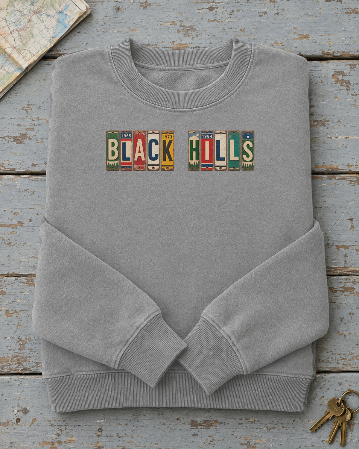 Black Hills, South Dakota vintage license plate sweatshirt in Grey