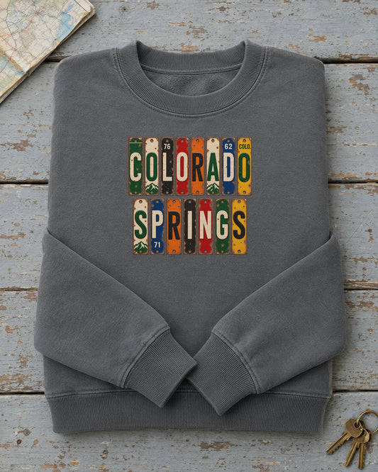 Colorado Springs, Colorado vintage license plate sweatshirt in Pepper