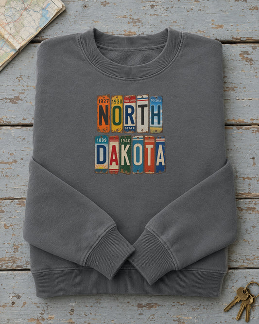 North Dakota vintage license plate sweatshirt in Pepper