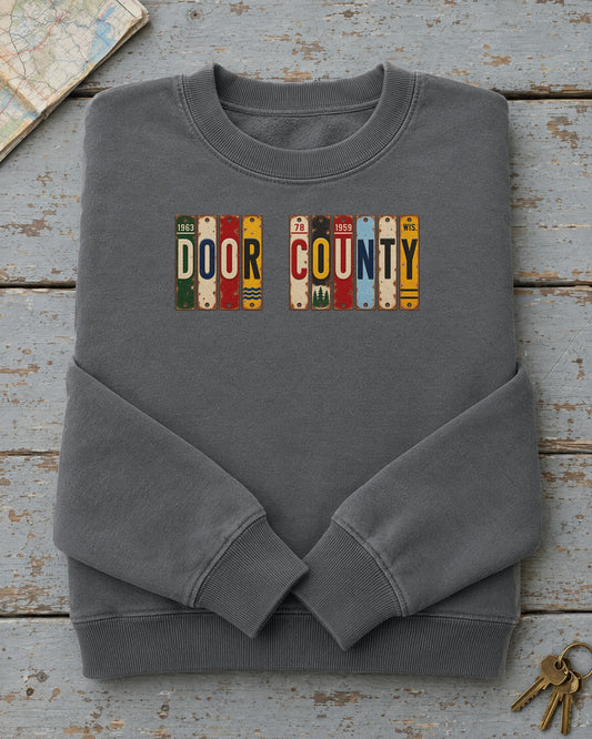 Door County, Wisconsin vintage license plate sweatshirt in Pepper