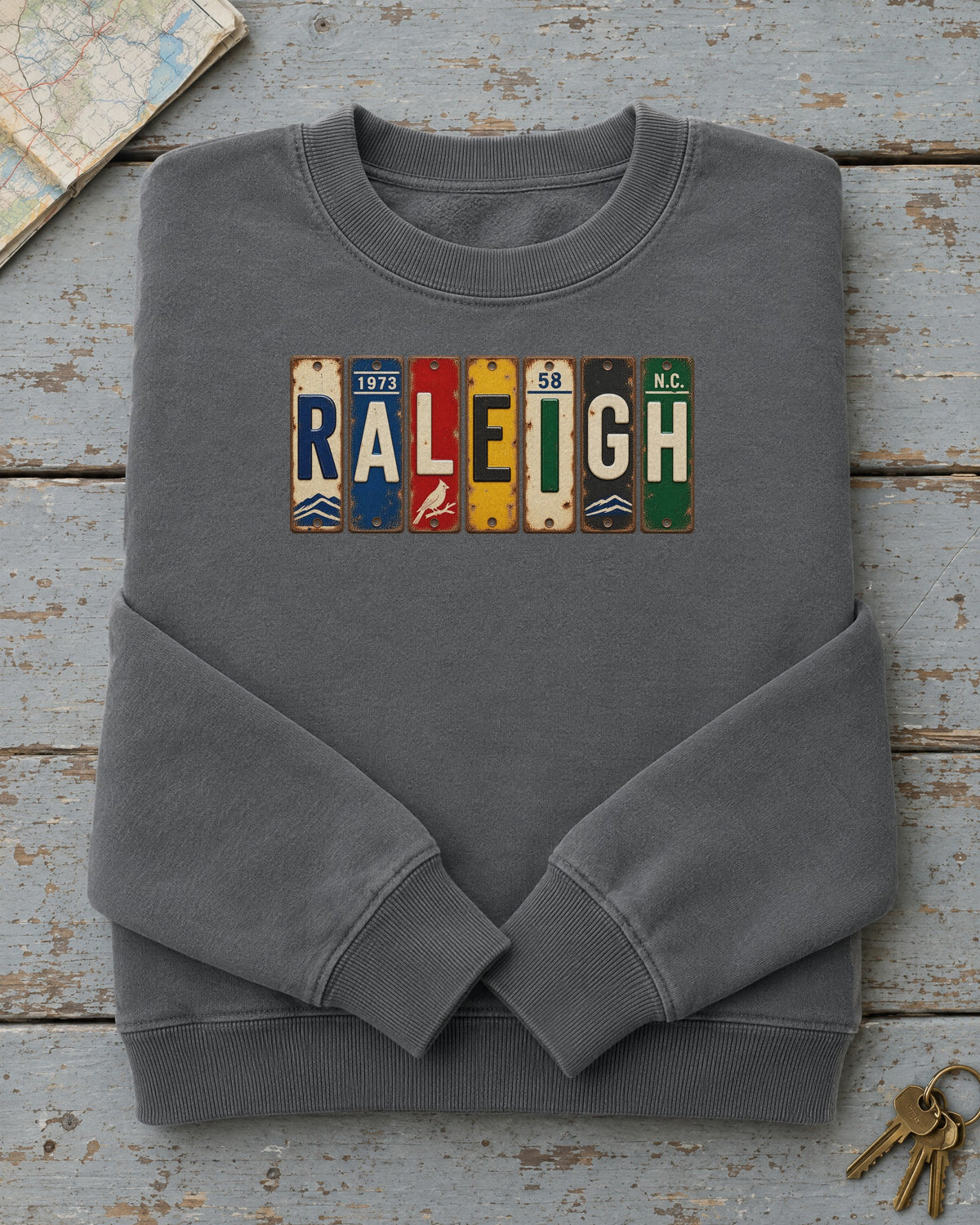 Raleigh, North Carolina vintage license plate sweatshirt in Pepper