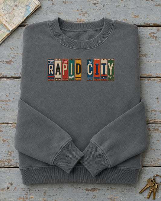 Rapid City, South Dakota vintage license plate sweatshirt in Pepper