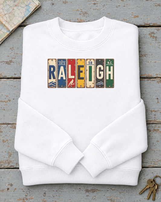 Raleigh, North Carolina vintage license plate sweatshirt in White
