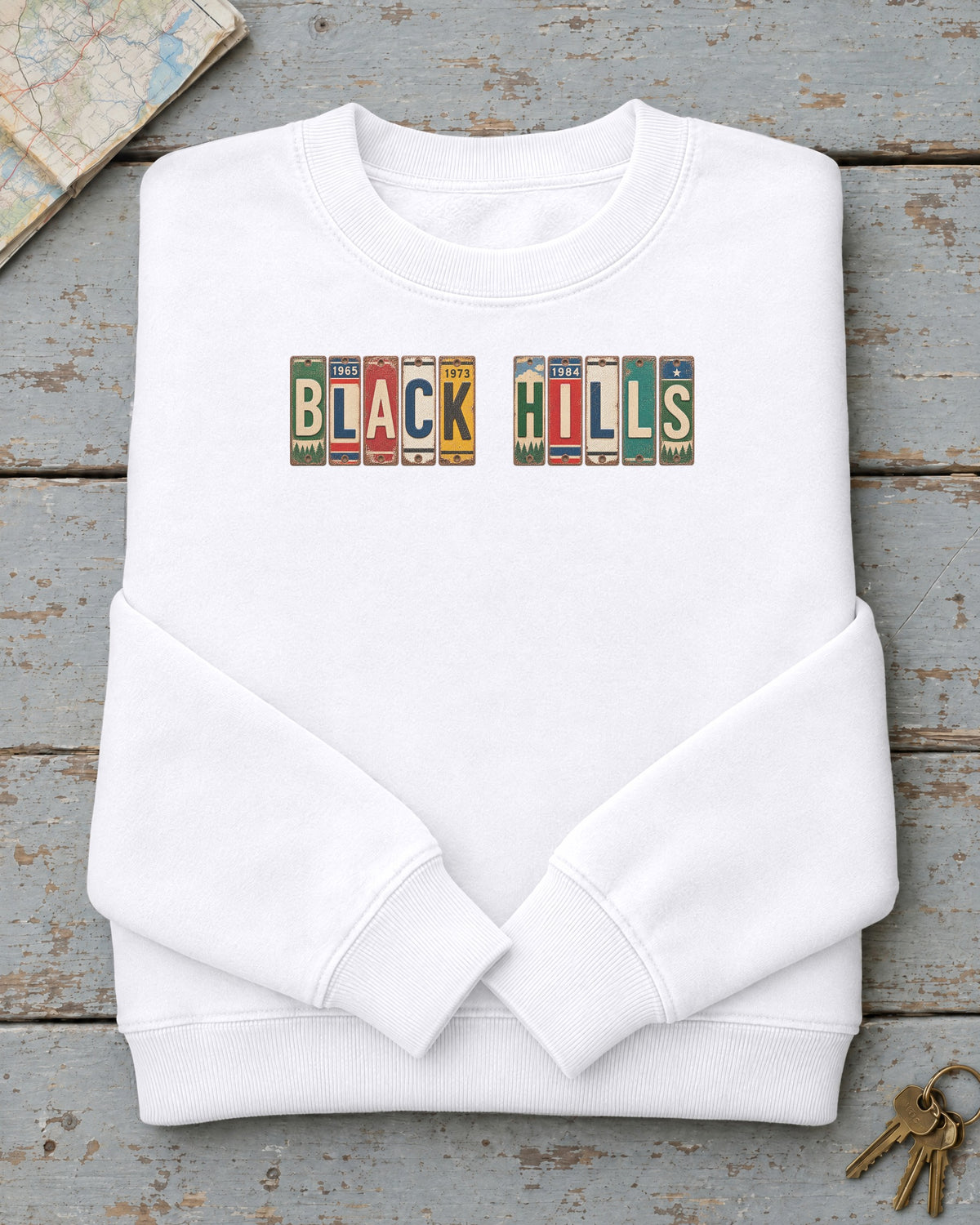 Black Hills, South Dakota vintage license plate sweatshirt in White