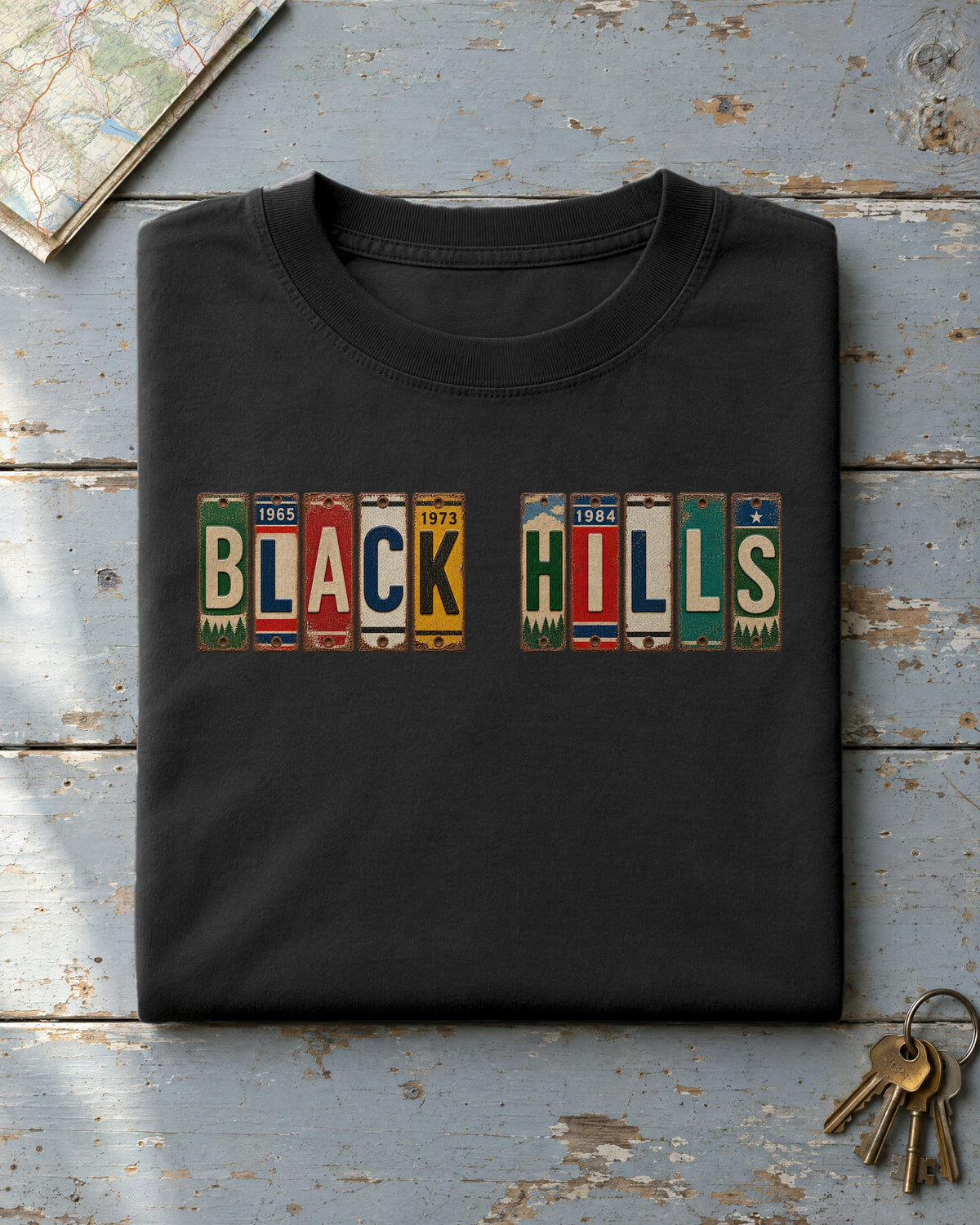 Black Hills, South Dakota vintage license plate t-shirt in Black
