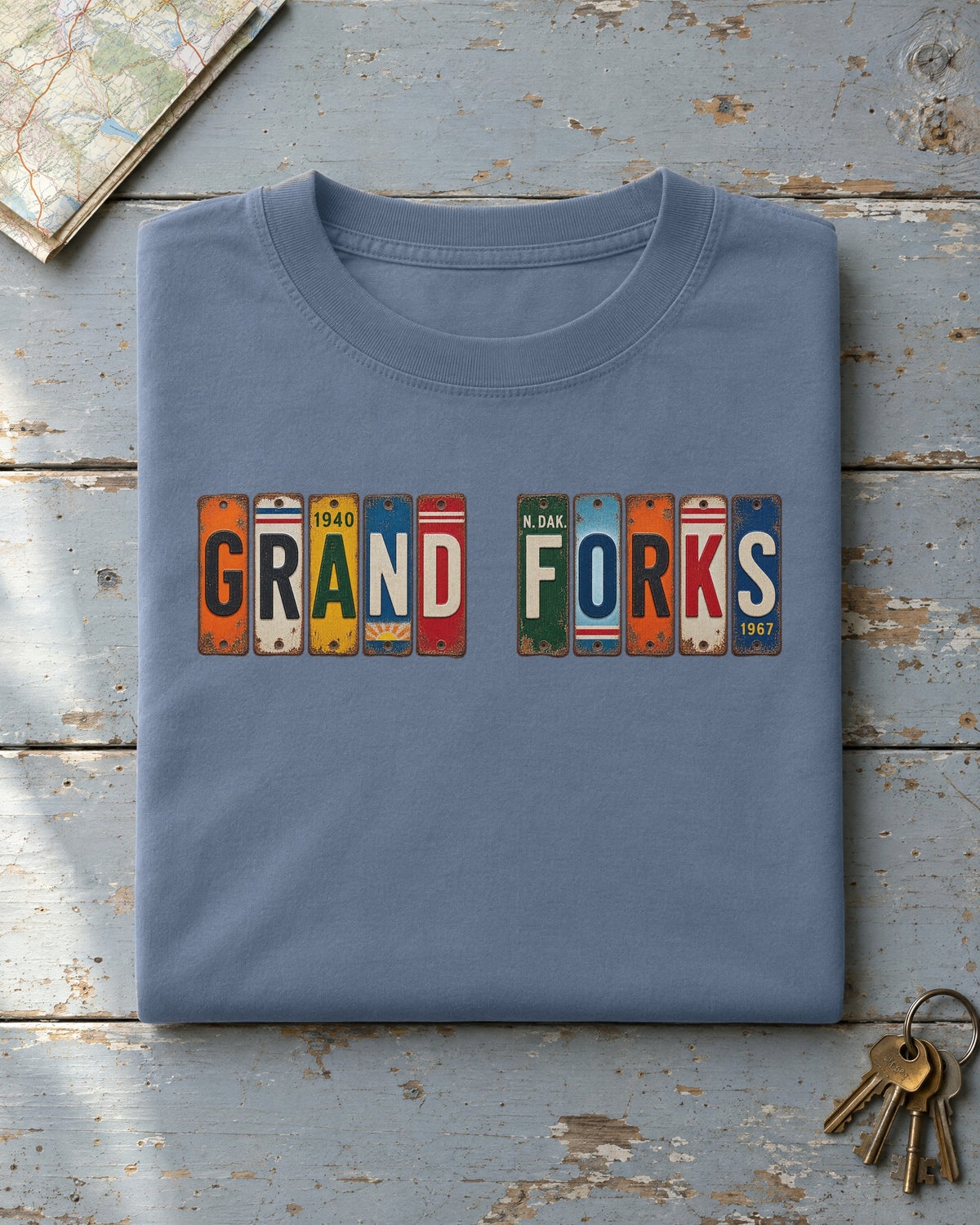 Grand Forks, North Dakota vintage license plate t-shirt in Blue Jean
