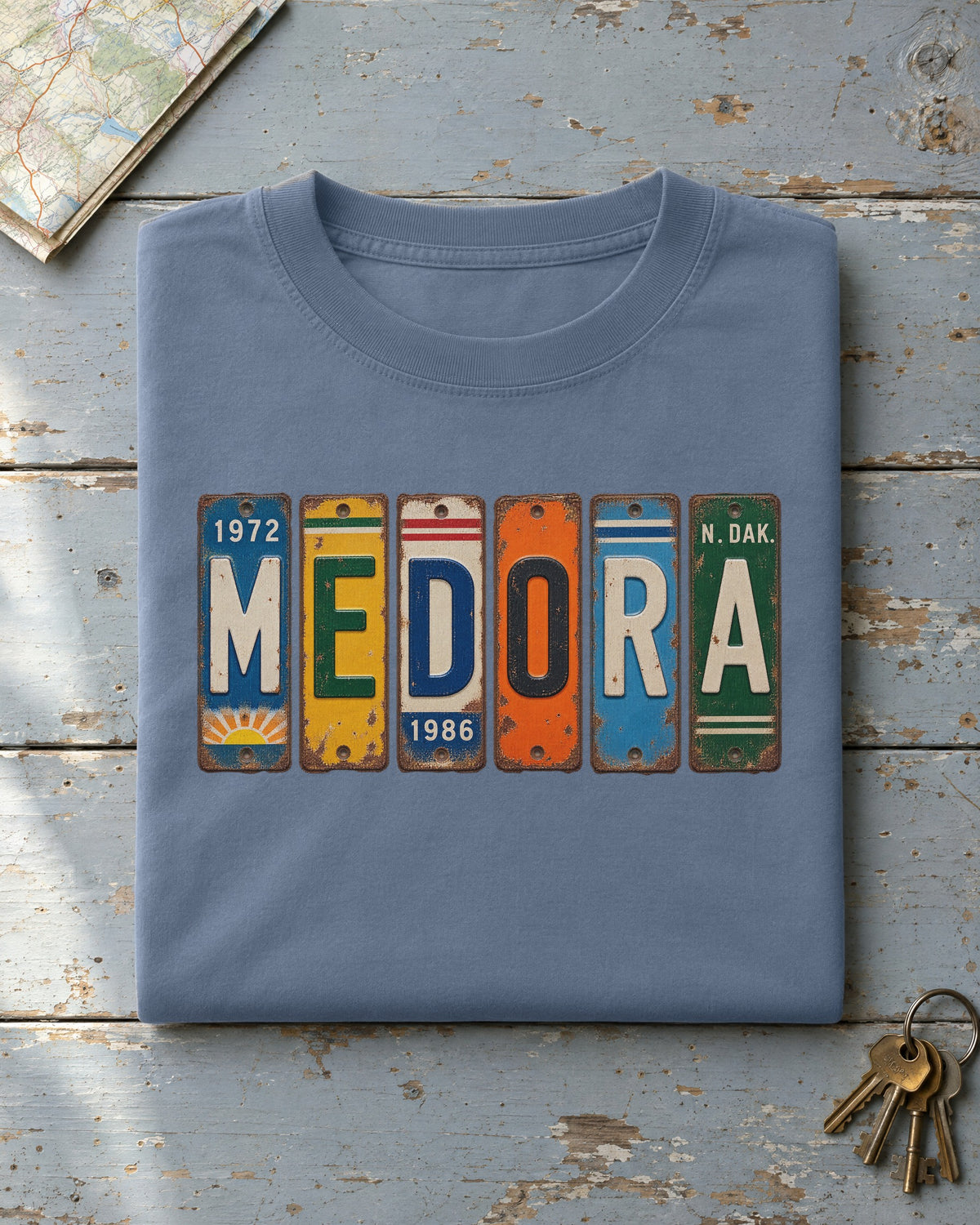 Medora, North Dakota vintage license plate t-shirt in Blue Jean