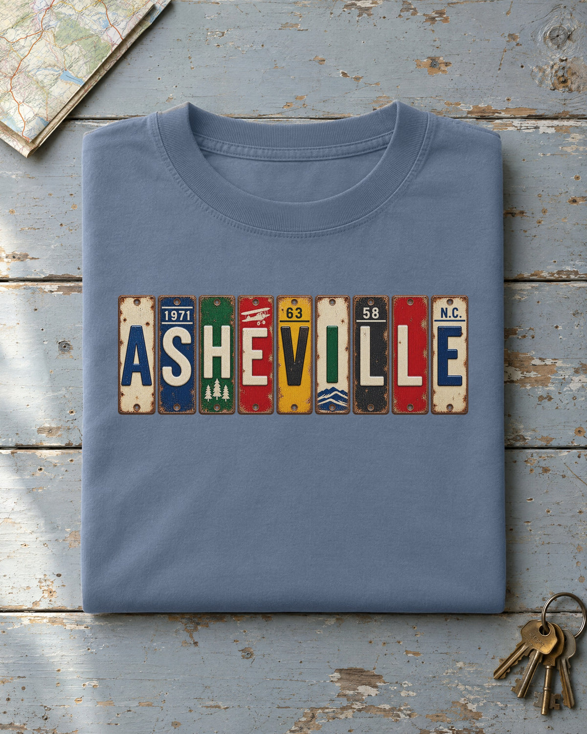 Asheville, North Carolina vintage license plate t-shirt in Blue Jean