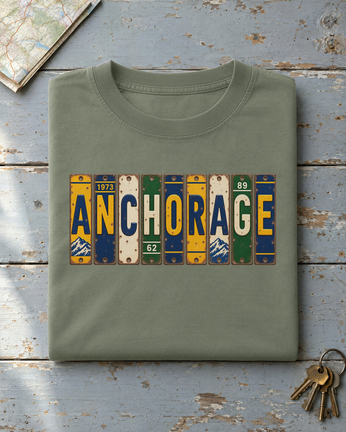 Anchorage, Alaska vintage license plate t-shirt in Moss