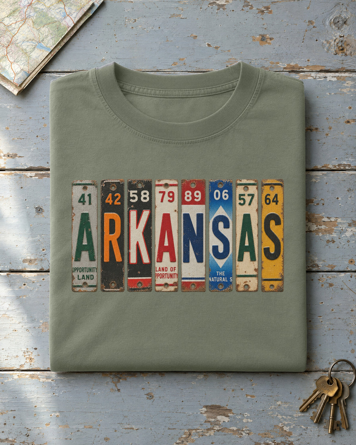 Arkansas vintage license plate t-shirt in Moss