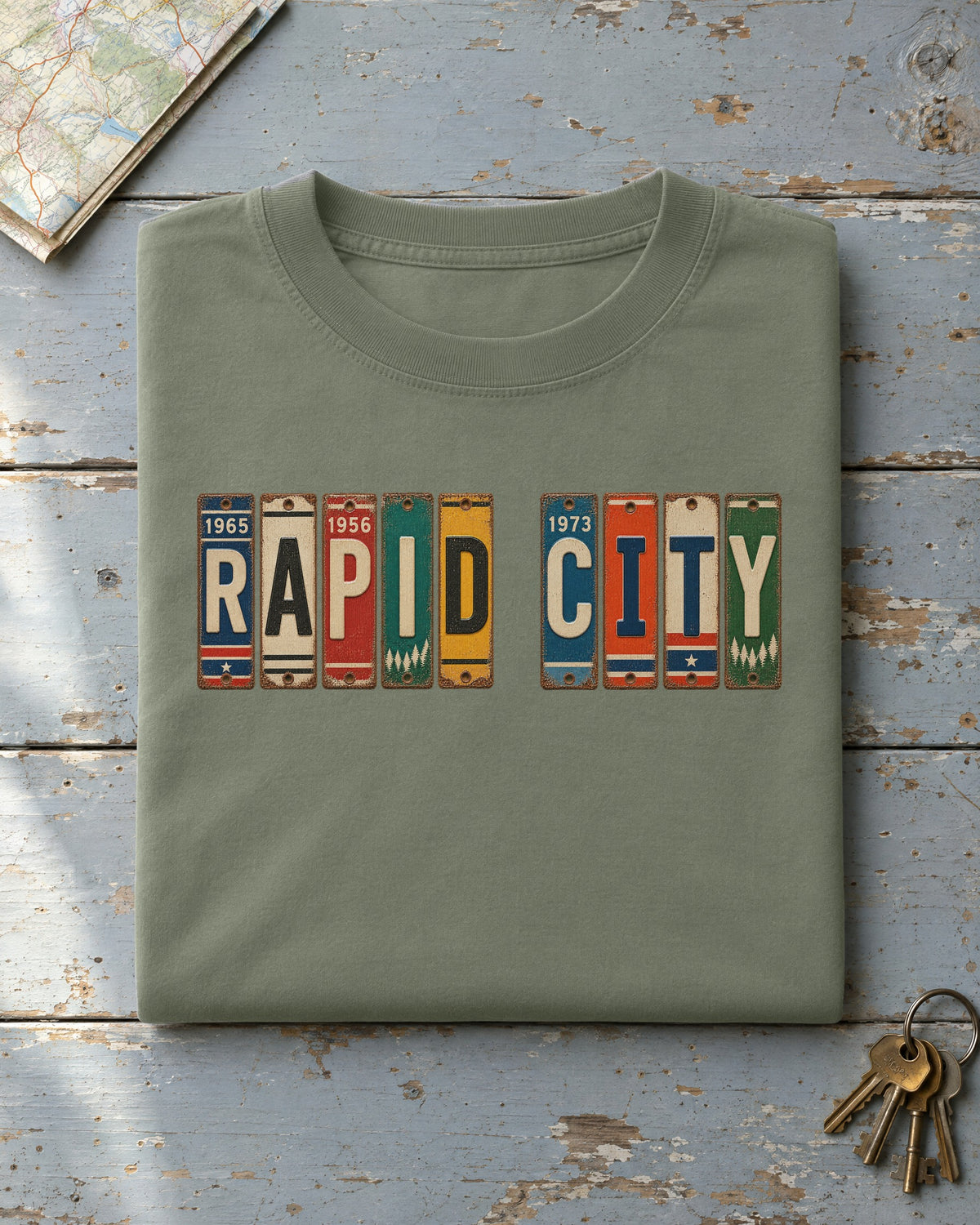 Rapid City, South Dakota vintage license plate t-shirt in Moss