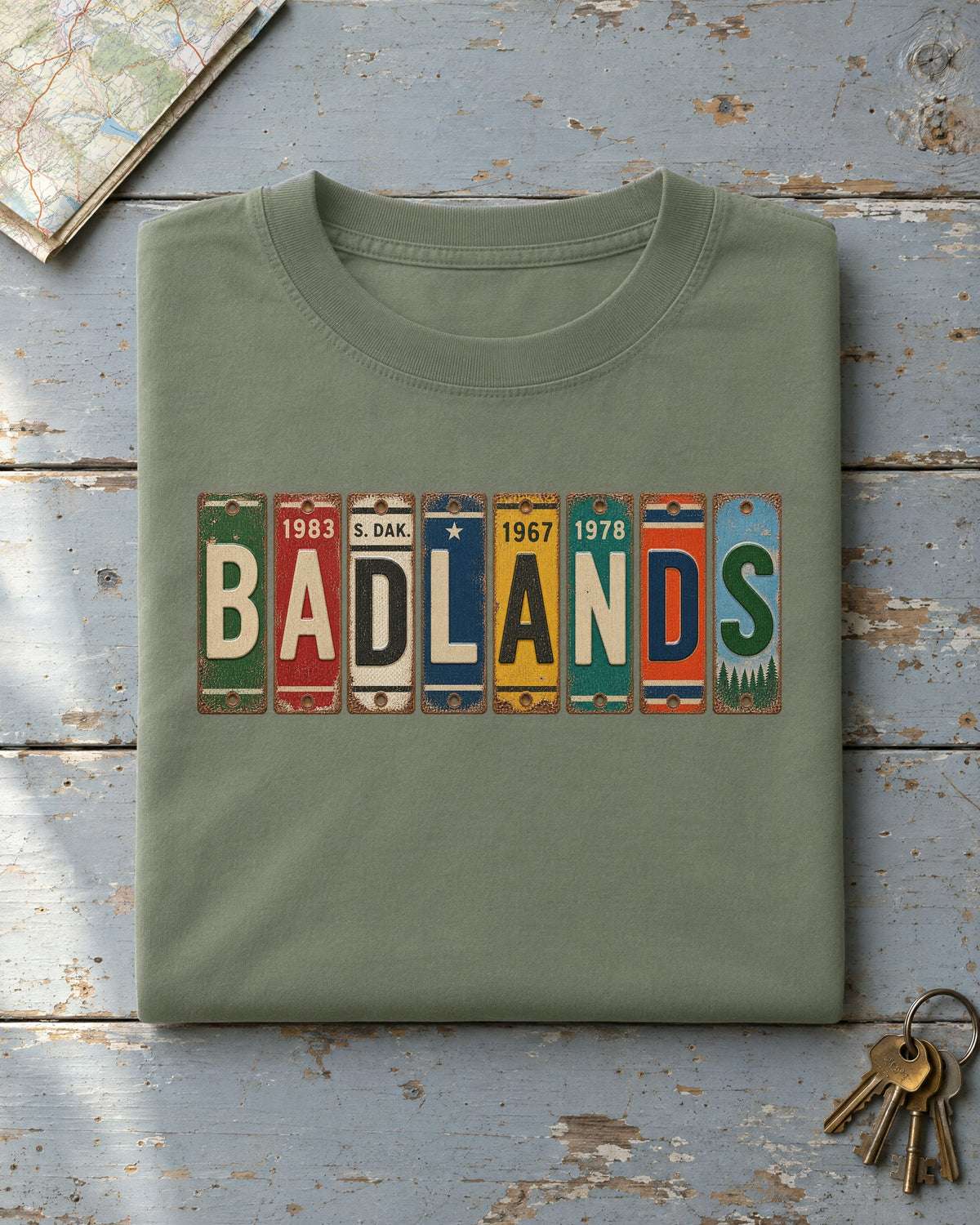 Badlands, South Dakota vintage license plate t-shirt in Moss