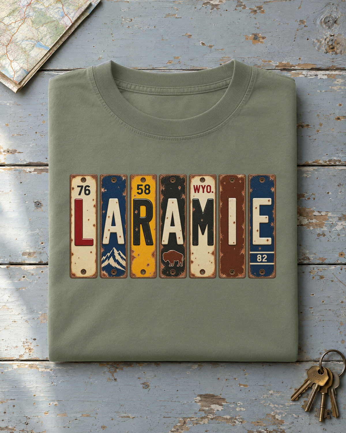 Laramie, Wyoming vintage license plate t-shirt in Moss