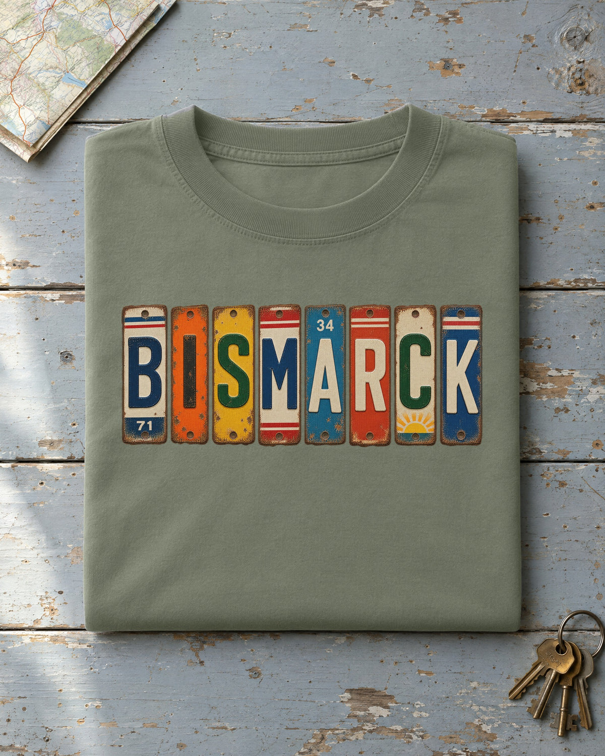 Bismarck, North Dakota vintage license plate t-shirt in Moss