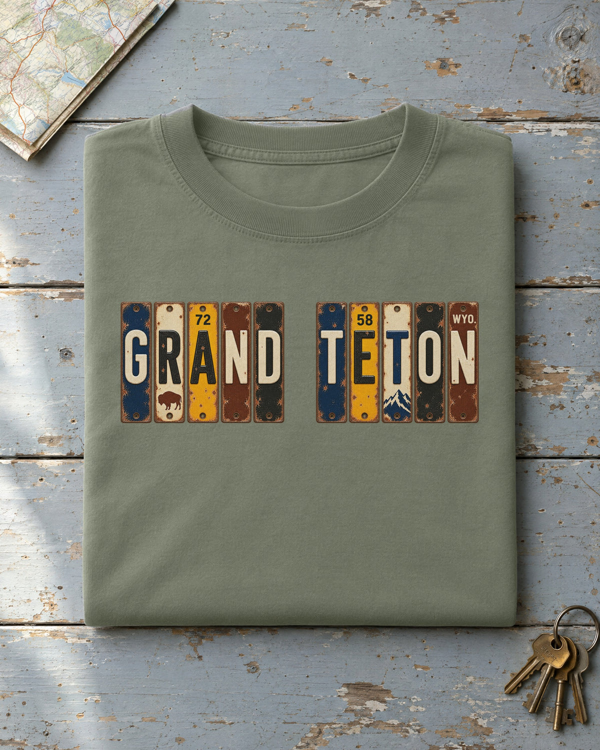 Grand Teton, Wyoming vintage license plate t-shirt in Moss