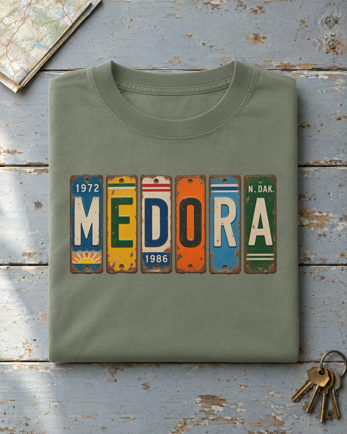 Medora, North Dakota vintage license plate t-shirt in Moss