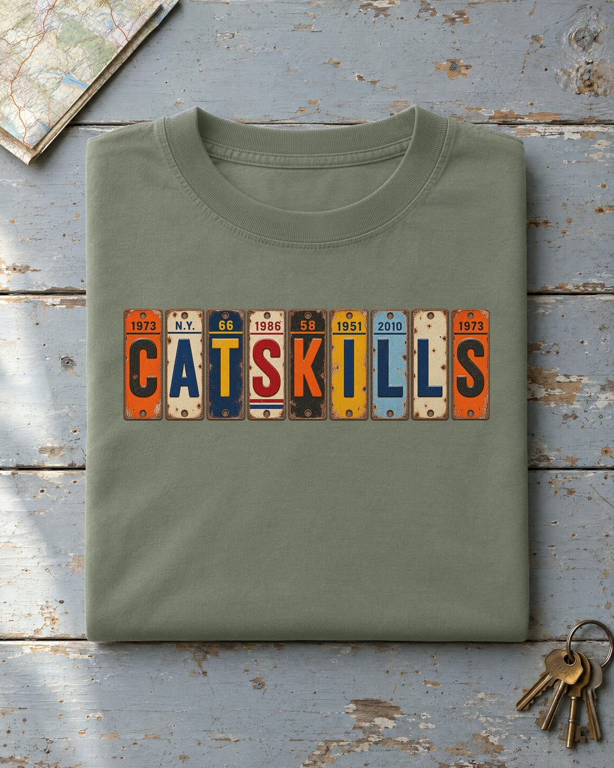 Catskills, New York vintage license plate t-shirt in Moss