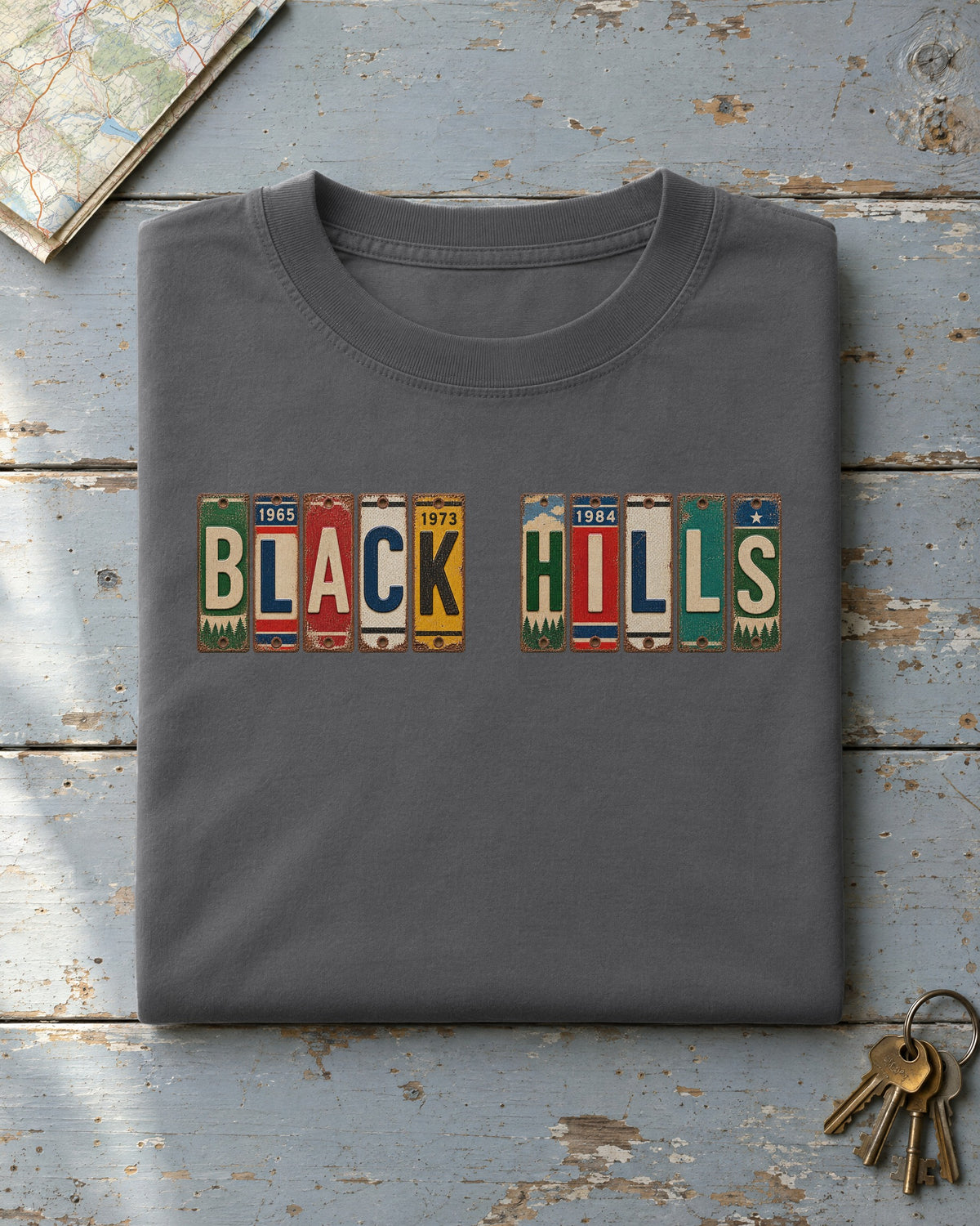 Black Hills, South Dakota vintage license plate t-shirt in Pepper