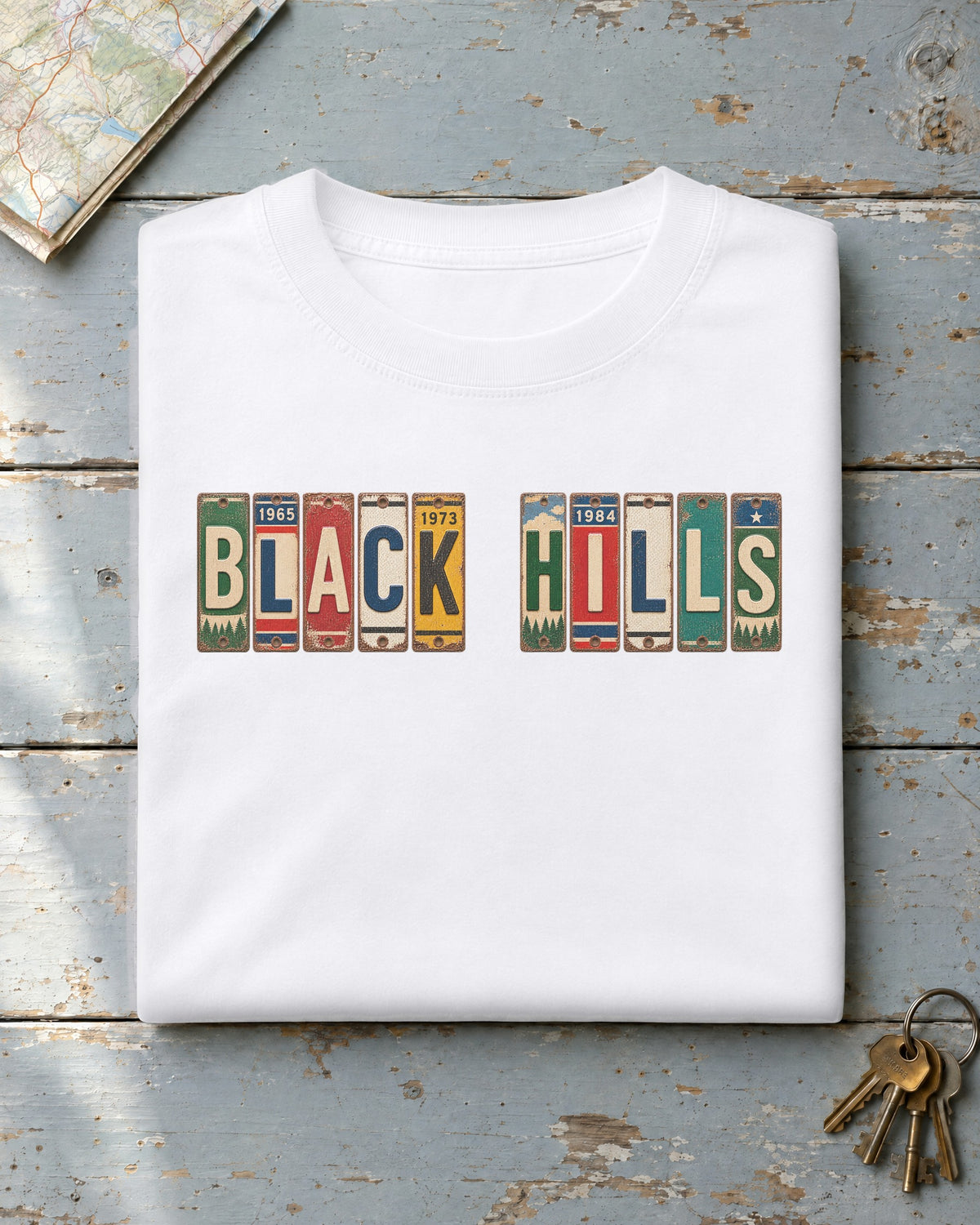 Black Hills, South Dakota vintage license plate t-shirt in White