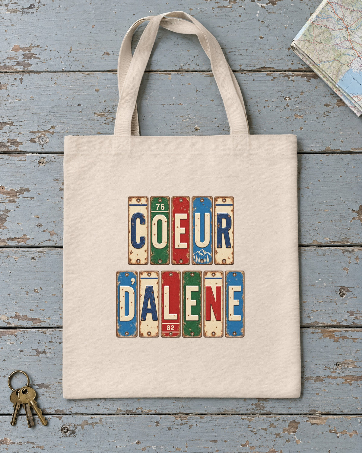 Coeur d'Alene, Idaho vintage license plate tote bag in Natural