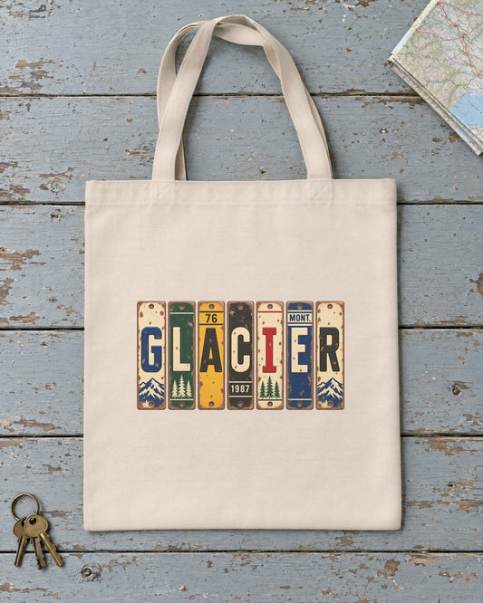 Glacier, Montana vintage license plate tote bag in Natural