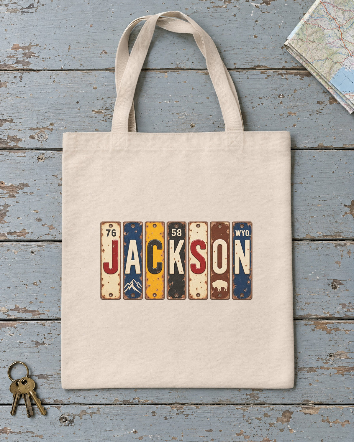 Jackson, Wyoming vintage license plate tote bag in Natural