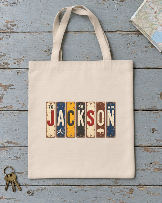 Jackson, Wyoming vintage license plate tote bag in Natural