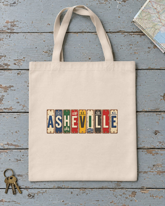 Asheville, North Carolina vintage license plate tote bag in Natural