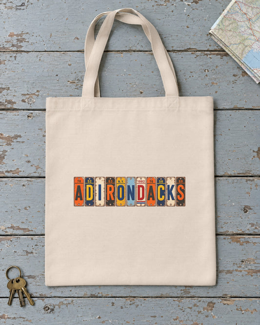 Adirondacks, New York vintage license plate tote bag in Natural
