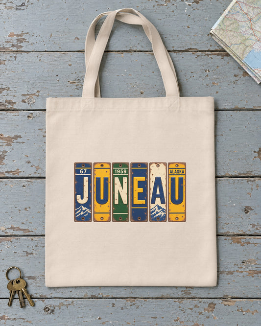 Juneau, Alaska vintage license plate tote bag in Natural