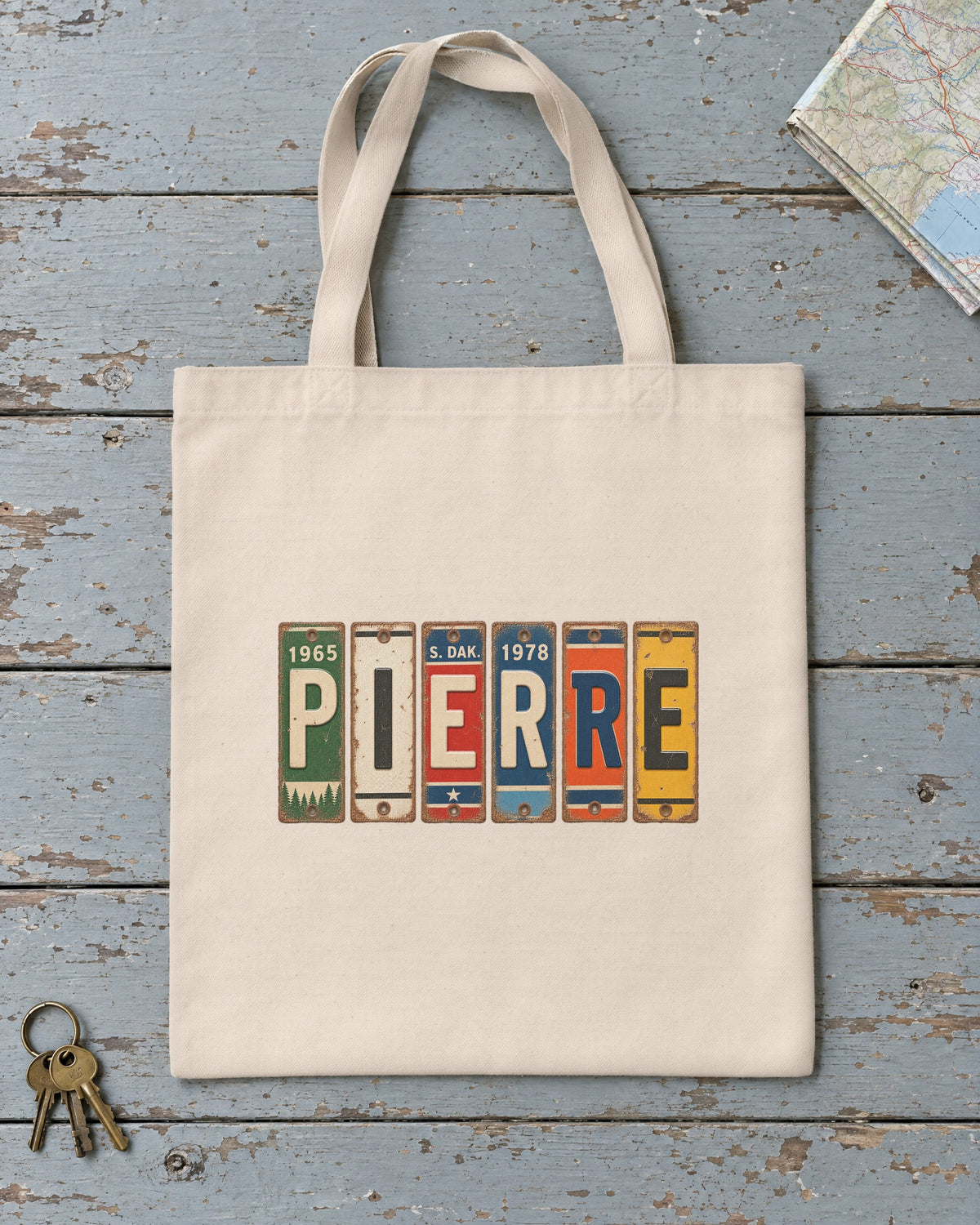 Pierre, South Dakota vintage license plate tote bag in Natural