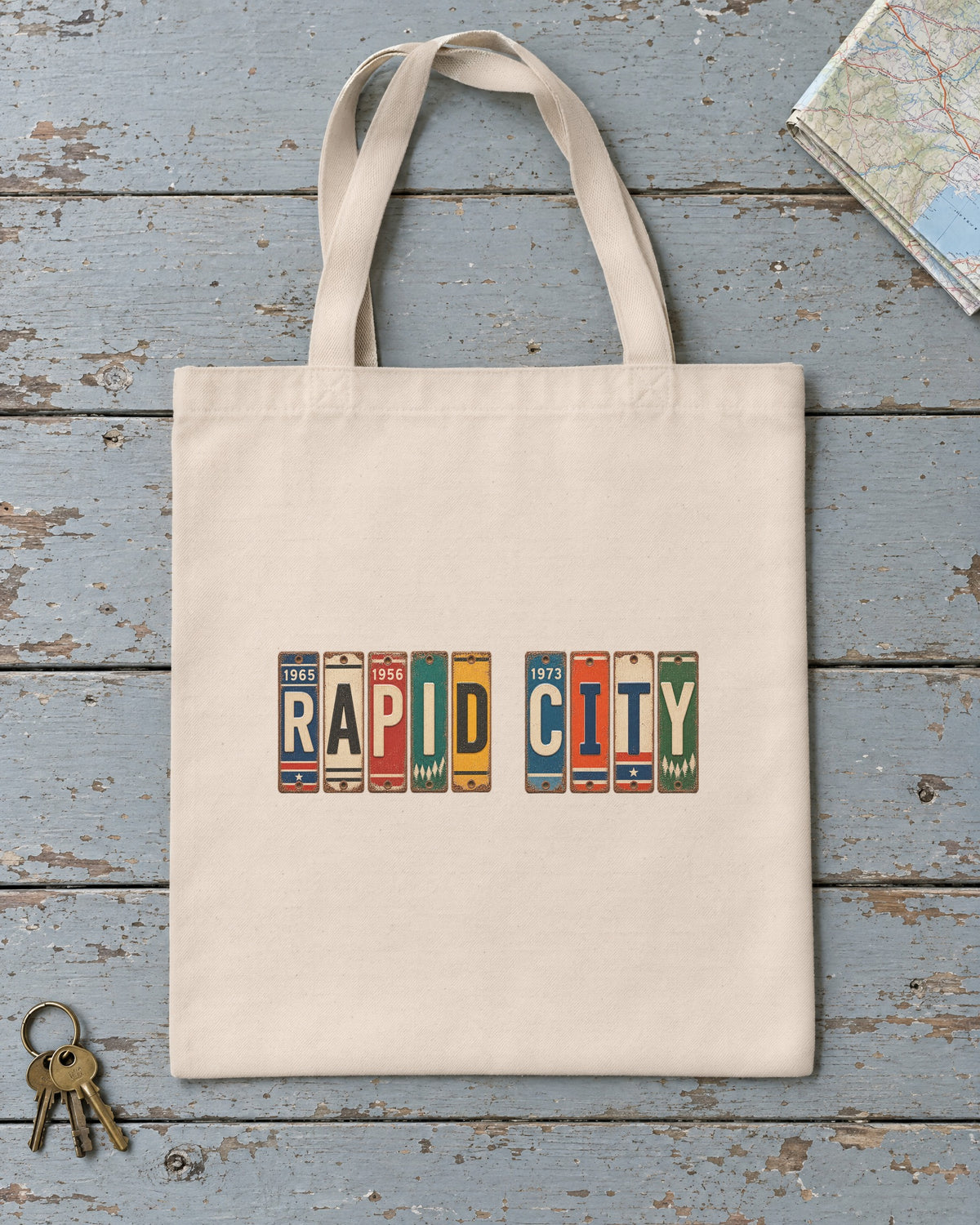 Rapid City, South Dakota vintage license plate tote bag in Natural